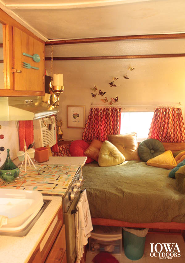 Glamping takes traditional campers and kicks it up a notch with retro style, like this comfy setup | Iowa Outdoors magazine